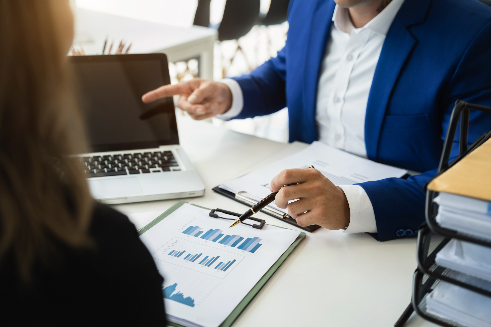 business people discussing on performance revenue in meeting. businessman working with co-worker team. financial adviser analysing data with investor.